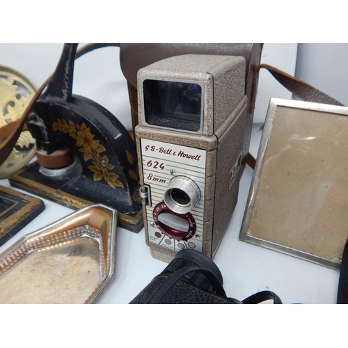 395 - A Box containing a variety of items including three Victorian cast Iron company seals, child's blue ... 