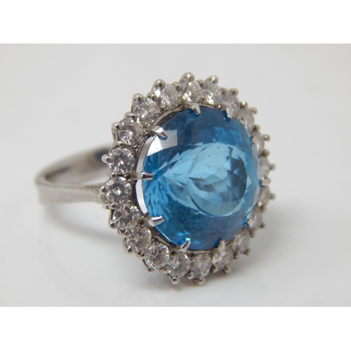 30 - Platinum Ring Set with a Large Central Topaz 15mm diameter within a Border of 20 Round Brilliant Cut... 