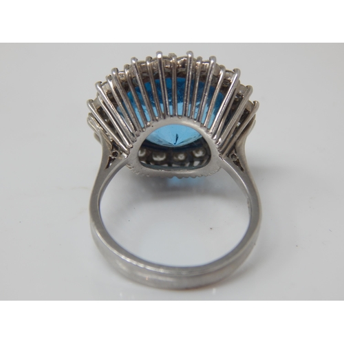 30 - Platinum Ring Set with a Large Central Topaz 15mm diameter within a Border of 20 Round Brilliant Cut... 