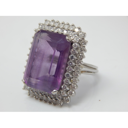 33 - 18ct Gold Ring Set with a Large Amethyst 18mm x 12mm within a Double Border of Round Brilliant Cut D... 