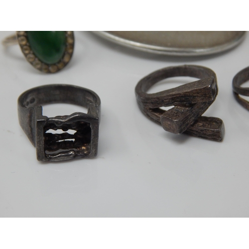 46 - A Quantity of Silver 1960's/70s Modernist Rings together with further silver rings and a large white... 