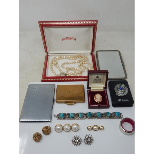 54 - A Quantity of Items Including a yellow Metal Christian Dior Brooch, further brooches, yellow metal p... 