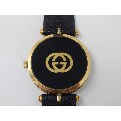 16 - GUCCI: Ladies Wristwatch, The White Dial with Black Chapter Ring & Roman Numerals on Original Gucci ... 