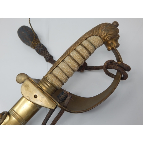 404 - A 19th Century Victorian 1827 pattern British naval officers sword. Brass Lions head pommel with a r... 