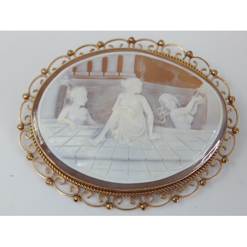 2 - Large 9ct Gold Framed Cameo Brooch Depicting Classical Maidens Bathing. Measuring 7cm x 5.5cm