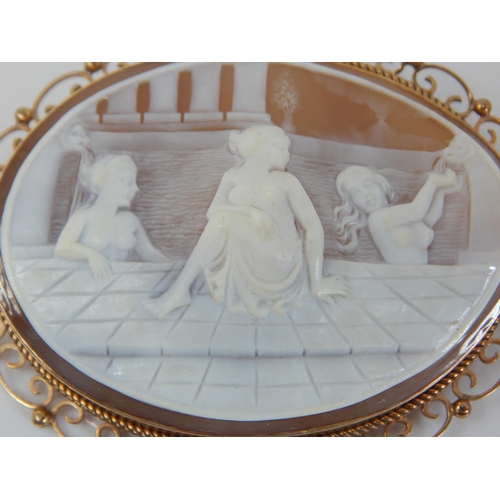 2 - Large 9ct Gold Framed Cameo Brooch Depicting Classical Maidens Bathing. Measuring 7cm x 5.5cm