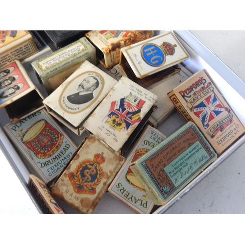 753 - A large quantity of military related match box holders and some empty cigarette boxes