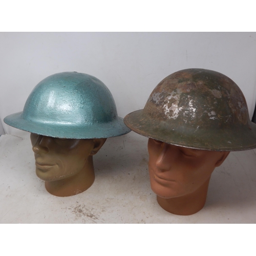 763 - WWI Raw Edge Steel Helmet (painted) together with a WWII Steel Brodie Helmet (2)