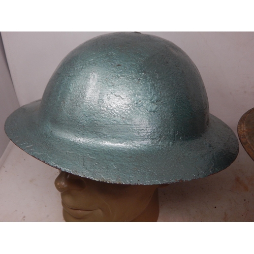 763 - WWI Raw Edge Steel Helmet (painted) together with a WWII Steel Brodie Helmet (2)