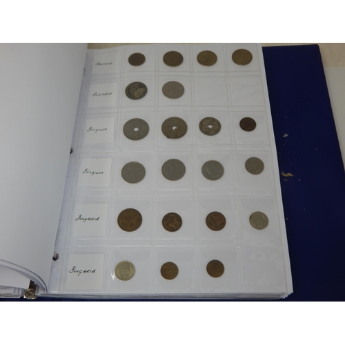 99L - A Coin Album containing a large quantity of British & foreign coinage including silver dating 18th c... 