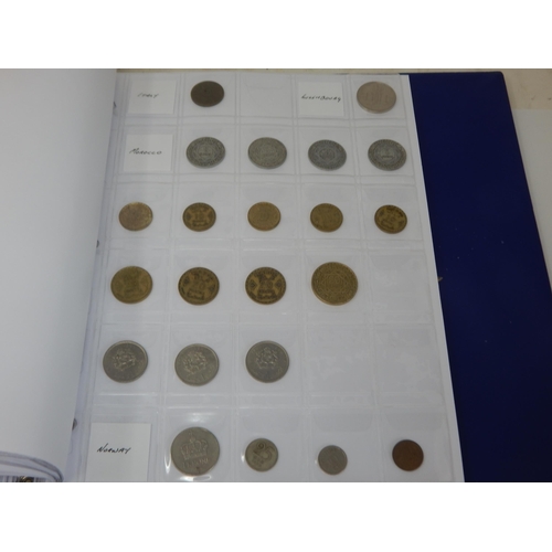 99L - A Coin Album containing a large quantity of British & foreign coinage including silver dating 18th c... 