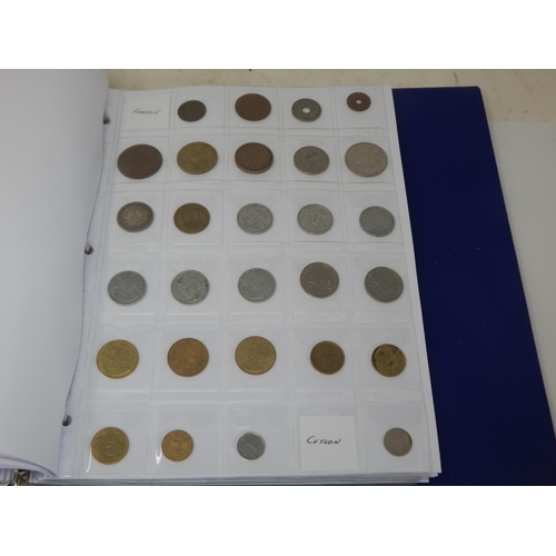 99L - A Coin Album containing a large quantity of British & foreign coinage including silver dating 18th c... 