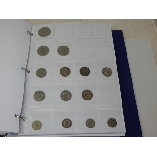 99L - A Coin Album containing a large quantity of British & foreign coinage including silver dating 18th c... 