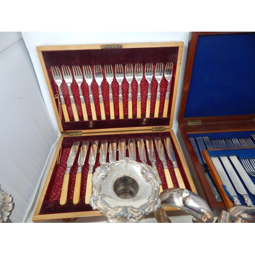 100N - A Collection of Silver Plated Wares Including a Pair of Candlesticks, Cased Flatware etc (lot)