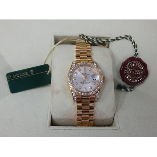 150A - ROLEX: Ladies 18ct Gold Rolex Oyster Perpetual Datejust 2009 (Ref. 179238) Serial No. V---324. White... 