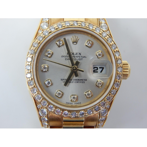 150A - ROLEX: Ladies 18ct Gold Rolex Oyster Perpetual Datejust 2009 (Ref. 179238) Serial No. V---324. White... 