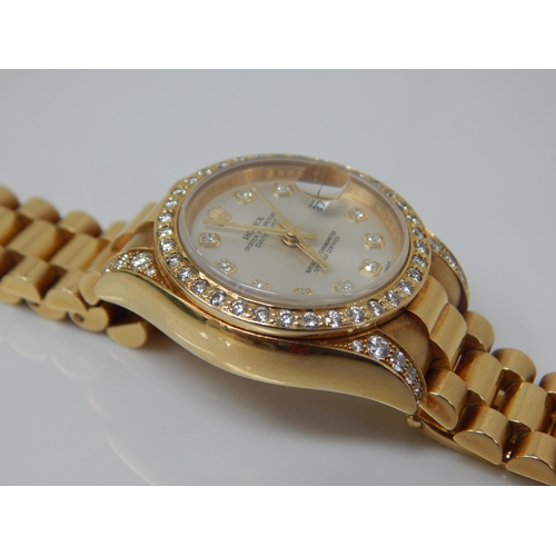 150A - ROLEX: Ladies 18ct Gold Rolex Oyster Perpetual Datejust 2009 (Ref. 179238) Serial No. V---324. White... 