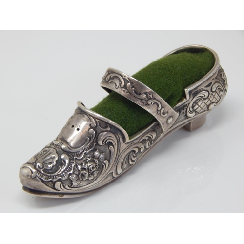 173 - Large Victorian Continental Silver Shoe Pin Cushion Dated 1900 with Rococo Decoration: Length 10cm