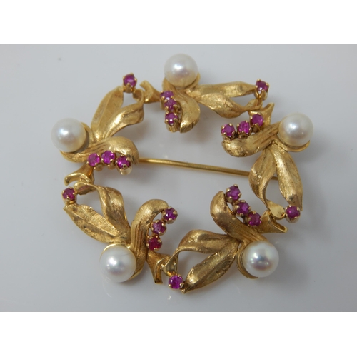 100 - 18ct Gold Ruby & Pearl Set Brooch: 4cm diameter: Gross weight 10.09g