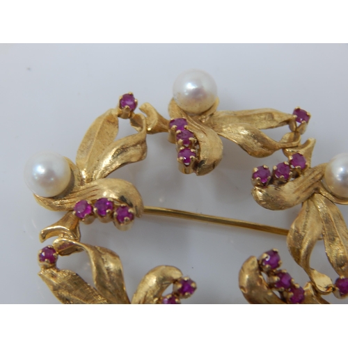 100 - 18ct Gold Ruby & Pearl Set Brooch: 4cm diameter: Gross weight 10.09g