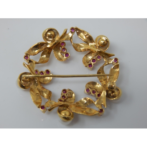 100 - 18ct Gold Ruby & Pearl Set Brooch: 4cm diameter: Gross weight 10.09g