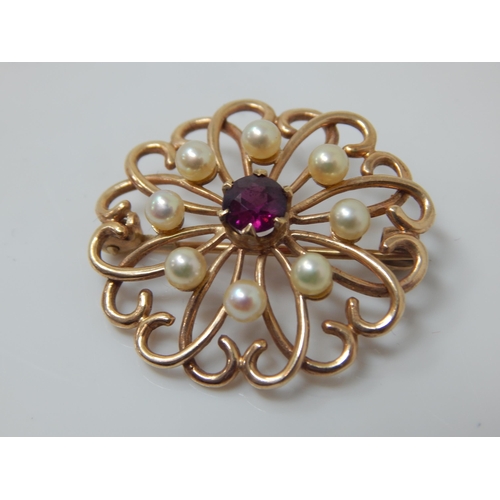 101 - 9ct Gold Ruby & Pearl Set Brooch: 3cm diameter: gross weight 5.19g