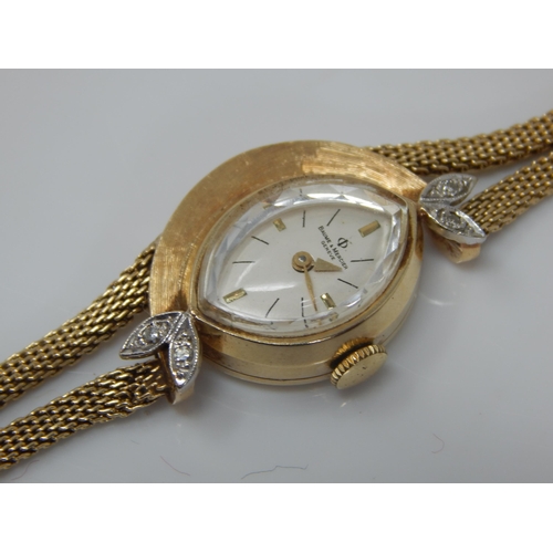 108 - Ladies 14ct Gold Baume & Mercier Wristwatch Set with Diamonds on 14ct Gold Strap in Original Case. G... 