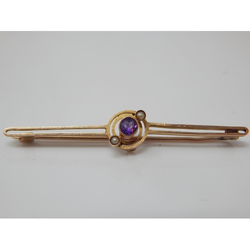 133 - Edwardian 15ct amethyst and pearl set target bar brooch – maker J.G.G – 2.6g