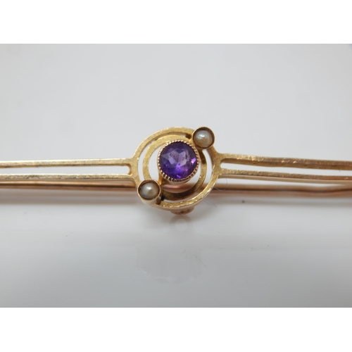 133 - Edwardian 15ct amethyst and pearl set target bar brooch – maker J.G.G – 2.6g