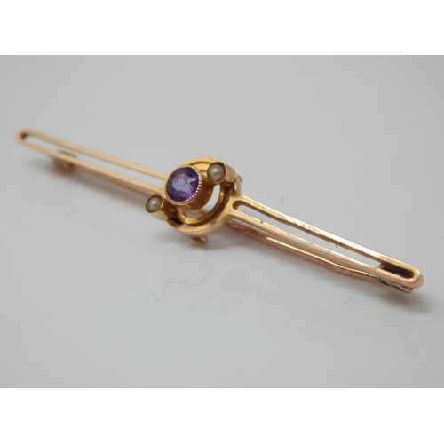 133 - Edwardian 15ct amethyst and pearl set target bar brooch – maker J.G.G – 2.6g