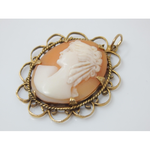 139 - Vintage shell-cameo profile pendant in Birmingham hallmarked 9ct gold scalloped mount - 40mm incl ba... 