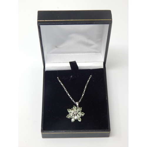 140 - A green sapphire star pendant set in 9ct white gold (24mm incl bale) on matching large link chain (4... 