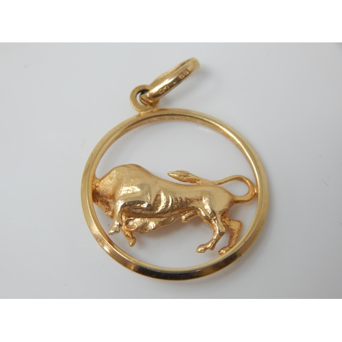 142 - A well-modelled cast 9ct gold Taurus pendant – 25mm diameter, 5.3g