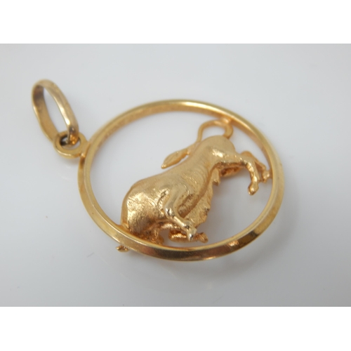 142 - A well-modelled cast 9ct gold Taurus pendant – 25mm diameter, 5.3g