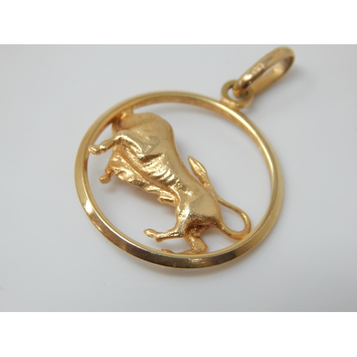 142 - A well-modelled cast 9ct gold Taurus pendant – 25mm diameter, 5.3g