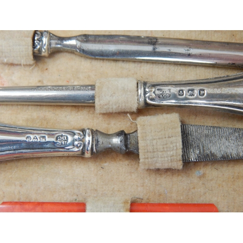 152 - Complete silver-mounted manicure set in original case - Birmingham and Chester 1914, Boots Pure Drug... 