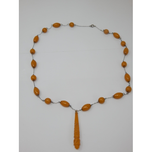 98 - Amber Bead Pendant Necklace: Length 68cm: Weight 26g