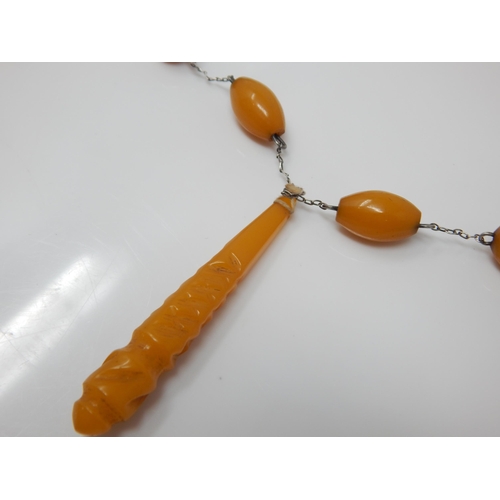 98 - Amber Bead Pendant Necklace: Length 68cm: Weight 26g