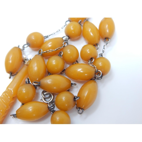 98 - Amber Bead Pendant Necklace: Length 68cm: Weight 26g