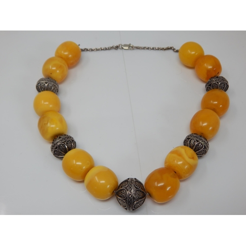 305 - Silver Mounted Large Amber Necklace: Weight 146g