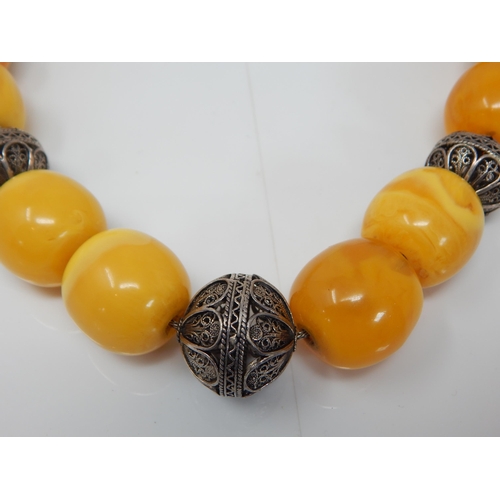 305 - Silver Mounted Large Amber Necklace: Weight 146g