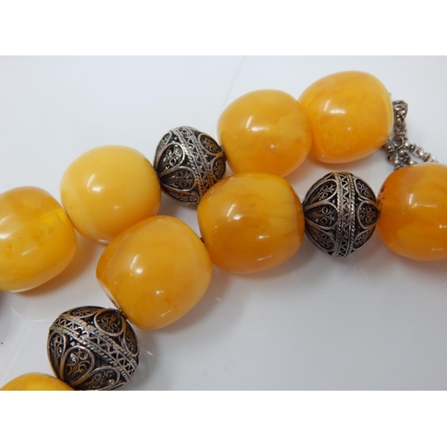 305 - Silver Mounted Large Amber Necklace: Weight 146g