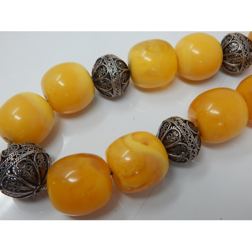 305 - Silver Mounted Large Amber Necklace: Weight 146g