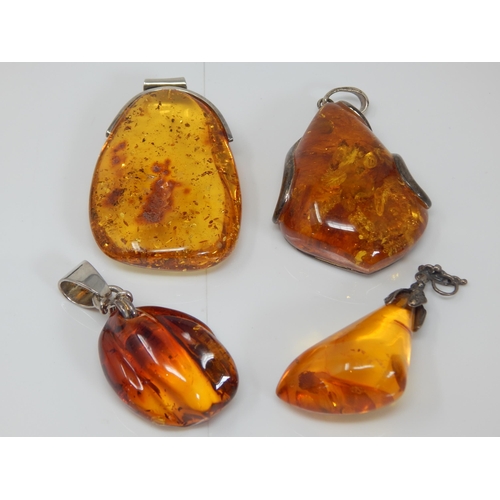 310 - 4 x Large Amber Pendants: Gross weight 126g