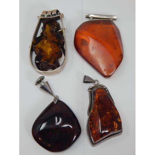 312 - 4 x Large Amber Pendants: Gross weight 128g
