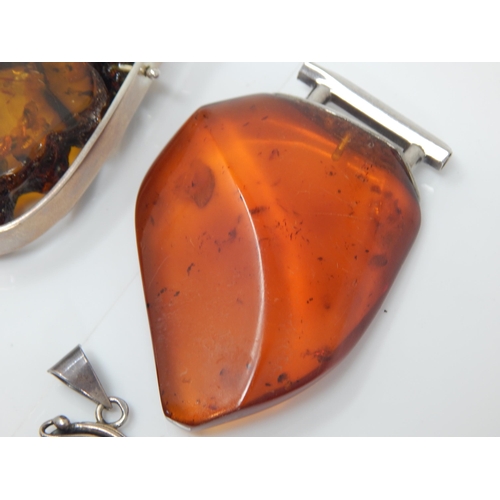 312 - 4 x Large Amber Pendants: Gross weight 128g