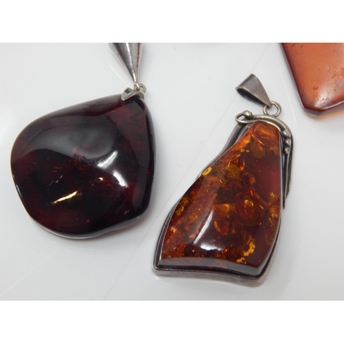 312 - 4 x Large Amber Pendants: Gross weight 128g
