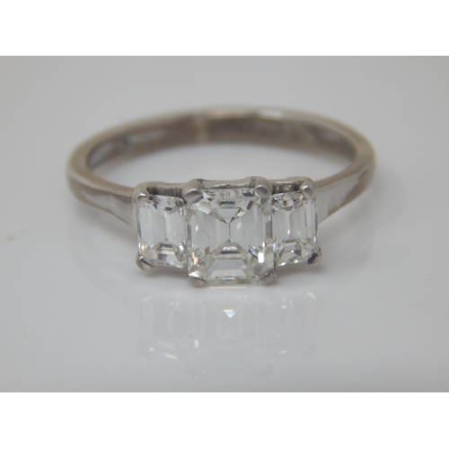 75 - 18ct White Gold 3 Stone Diamond Ring. The Central Princess Cut Diamond Estimated @ 1.0ct, Bordered b... 