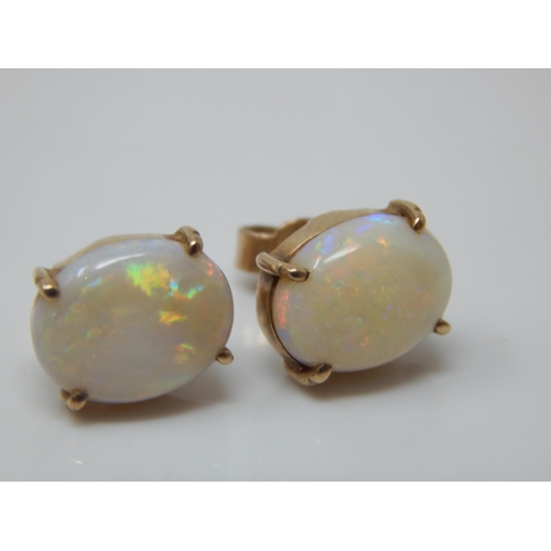 66 - 9ct Gold Opal Ring: Size N with Matching 9ct Gold Opal Earrings: Gross weight 6.48g