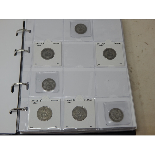 31 - An Album containing a Quantity of Silver Coinage & Further Coinage Including Florins, Shillings, Six... 